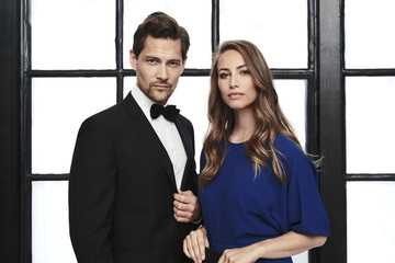 Smooth couple in dress and tuxedo, portrait