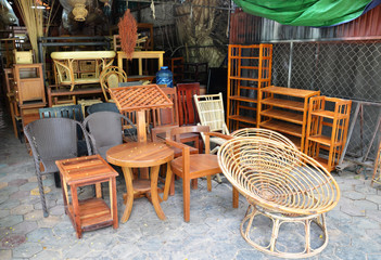 Wooden furniture outside their shop
