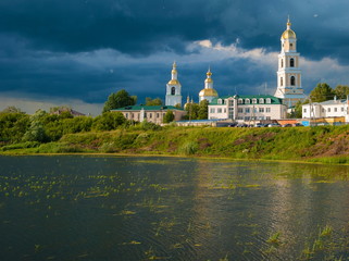 Fototapeta premium Lake and St. Seraphim of Sarov Diveevo monastery before hurricane