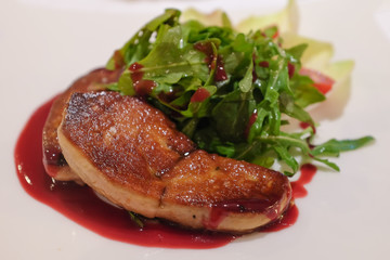 Grilled foie gras steak with green salad