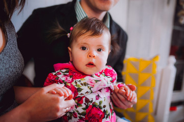 Happy Father And Baby Daughter Near By Christmas Tree And Fireplace In Christmas Evening