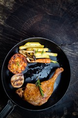 Grilled duck with frenchfries, tomato, onion, baby carrot and mu