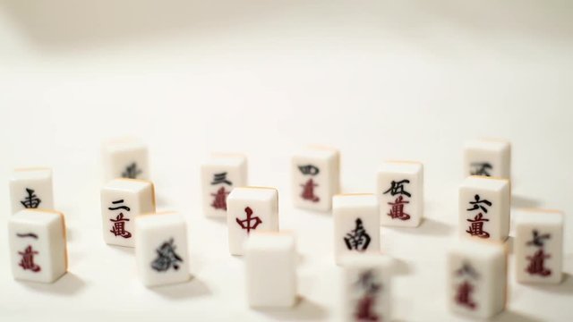 Mahjong pieces together Pan down
