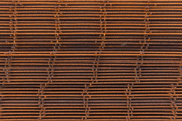 Stack of rusted reinforcing elements