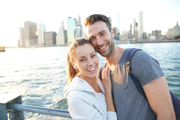 In love couple enjoying sunset on Brooklyn heights, NYC
