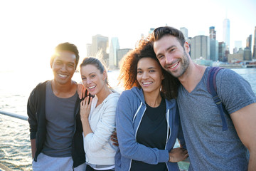 Group of friends enjoying sunset on Brooklyn heights promenade, NYC