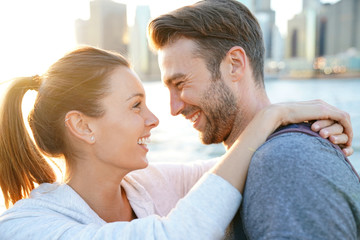 In love couple enjoying sunset on Brooklyn heights, NYC
