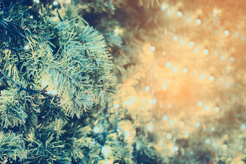 Fototapeta na wymiar christmas tree with bokeh light background
