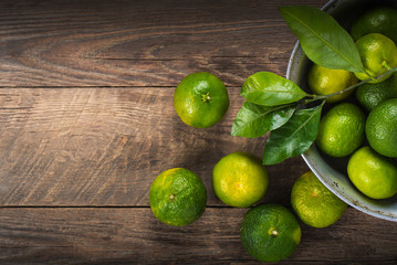 Tangerines on wooden background