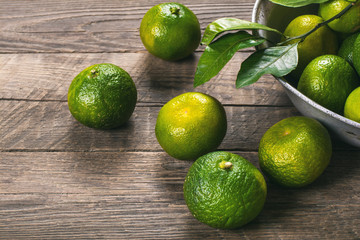 Tangerines on wooden background