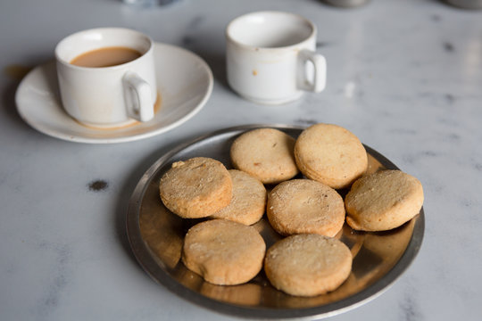 close-up of Osmania Biscuits and Chai at a Irani cafe in Hyderabad