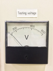 Old style voltmeter gauge. Voltage meter of test room for measurement voltage on controller panel....