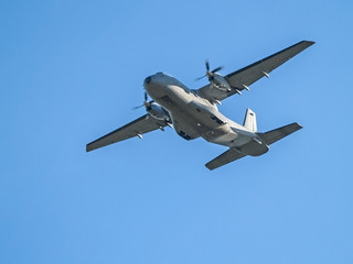 Fototapeta na wymiar Military airplane on the sky