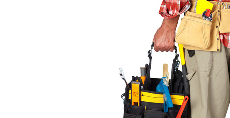 Hand of handyman with a tool bag.