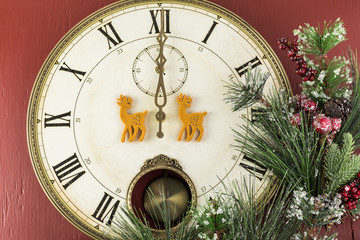 Beginning of  New Year celebration. Clock shows midnight.