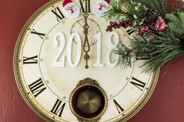 Beginning of 2018 New Year celebration. Clock shows midnight.