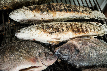 Grilled fish in Thai market,Thailand.The fish must be salted before grilling.