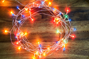 Colorful circle light on wooden. Christmas light background
