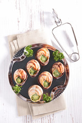 snail cooked with parsley and butter