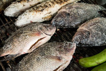 Grilled fish in Thai market,Thailand.The fish must be salted before grilling.