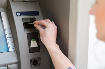 girl using atm