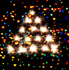  Christmas New Year's  tree form fireworks  sparks on hearts  dark background