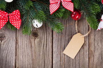 Christmas background with fir tree and bow decor