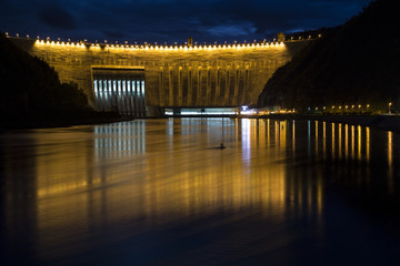 Fototapeta na wymiar Dam power station in the night light. Sayano-Shushenskaya HPP. Krasnoyarsk region. Russia.
