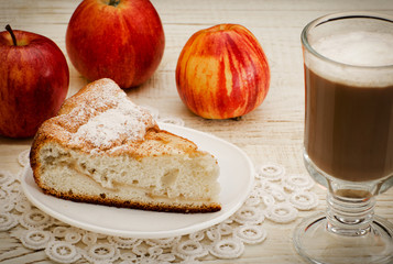 Apple pie, cappuccino and ripe apples, close-up
