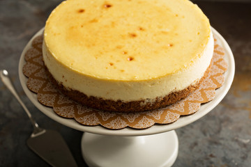 New York cheesecake on a cake stand