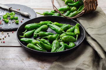 Raw green peppers jalapeno pimientos de padron traditional spanish tapas