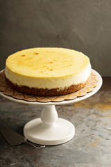 New York cheesecake on a cake stand