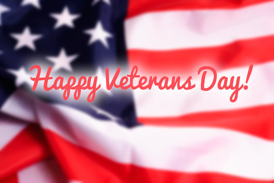 Happy Veterans Day on USA flag background