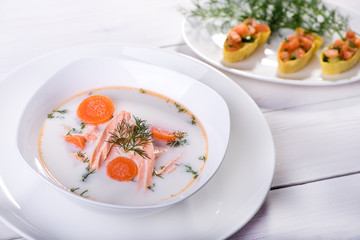 Fish soup with salmon and vegetables