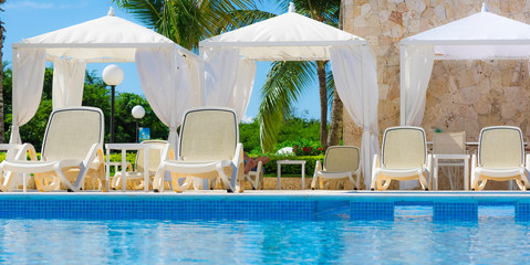  swimming pool with sun loungers