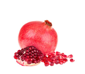 pomegranate fruit and cut a slice with scattered grains