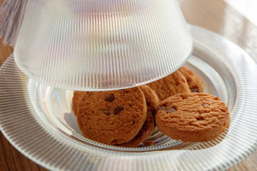Chocolate chip cookies on a glass plate