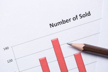 Office work space with paper chart and office accessories