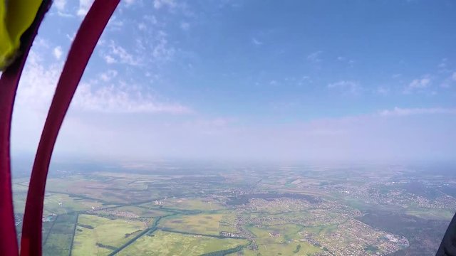 Skydiver in free fall opening parachute