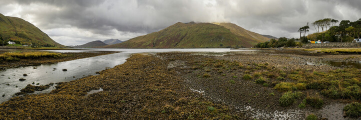 Panorama view of a mountain in a fjord.