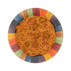 Colorful plate of spaghetti and meatballs on a white background top view.