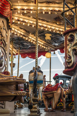 Carousel in amusement park.