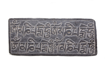 Mantra Stone on white background, Om Mani Padme Hum