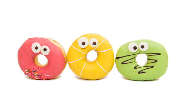 delicious donuts in color glaze