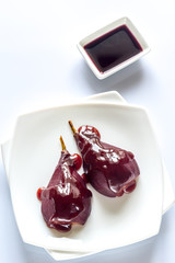 Merlot-poached pear on the plate