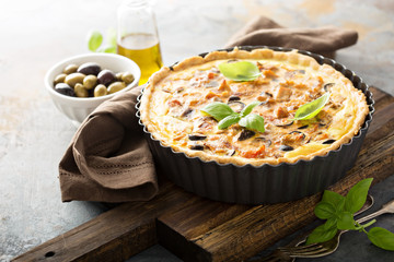 Quiche with eggplant, chicken and olives