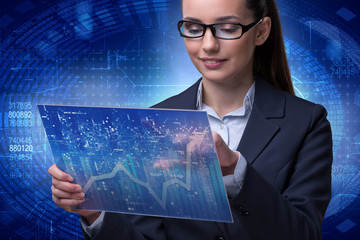 Businesswoman in stock exchange trading concept