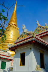 Beautiful of golden pagoda and thai art architecture in Wat Bovoranives, Bangkok, Thailand.