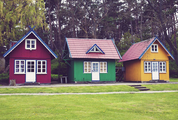 Fototapeta na wymiar Three empty colorful summer houses in Nida, Lithuania