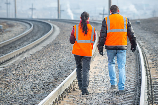 Railroad Workers Maintaing Railways